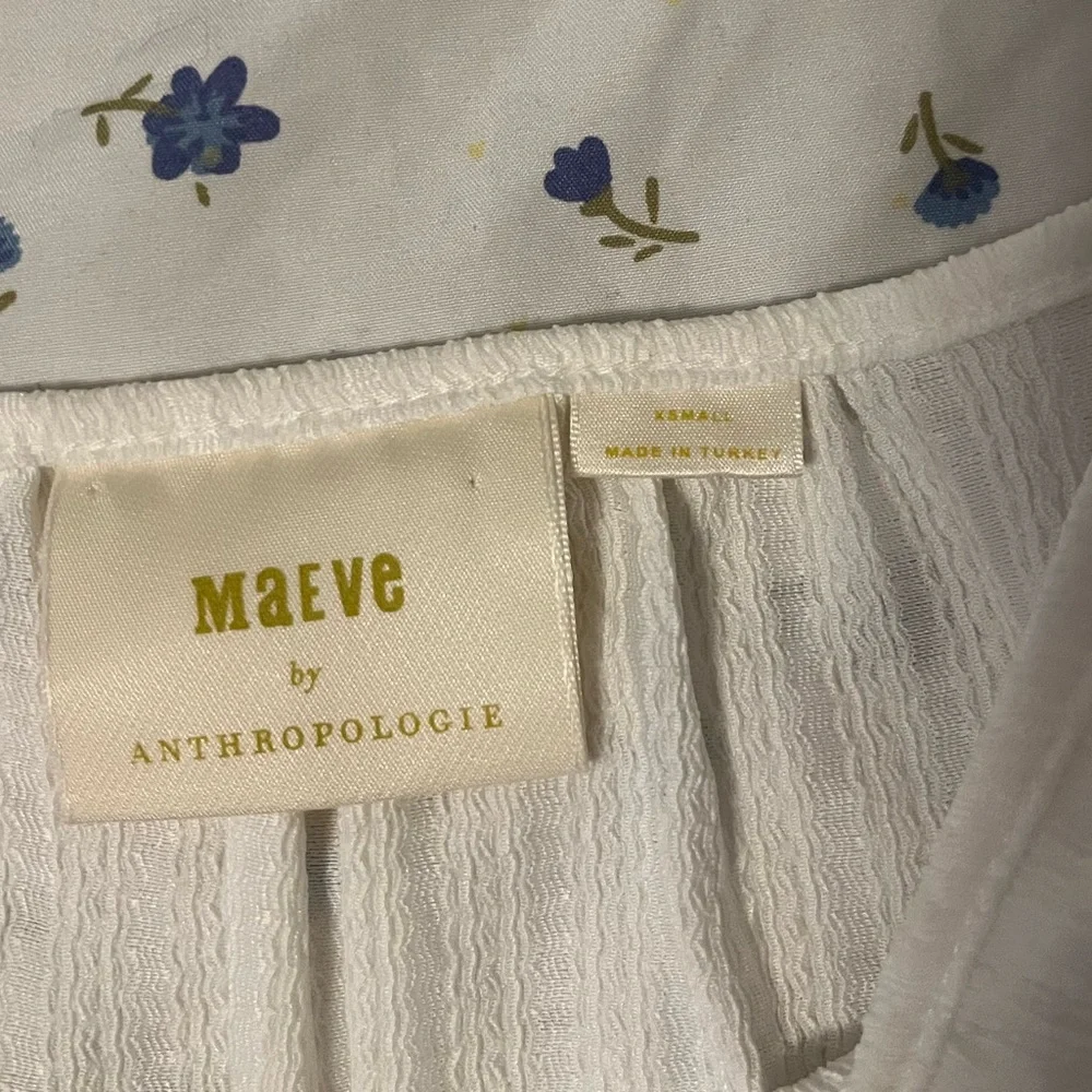 Anthropologie White Puff-Sleeve Smocked Waist Peplum Top